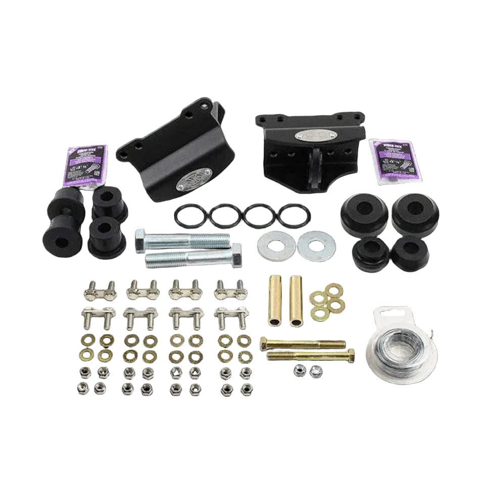 Automotive suspension components kit on a black background