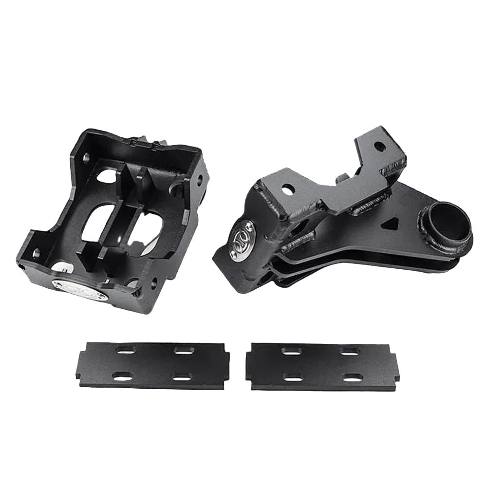 Two metal brackets and two flat plates on a black background