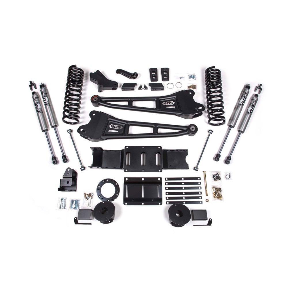 Collection of automotive suspension components on a white background