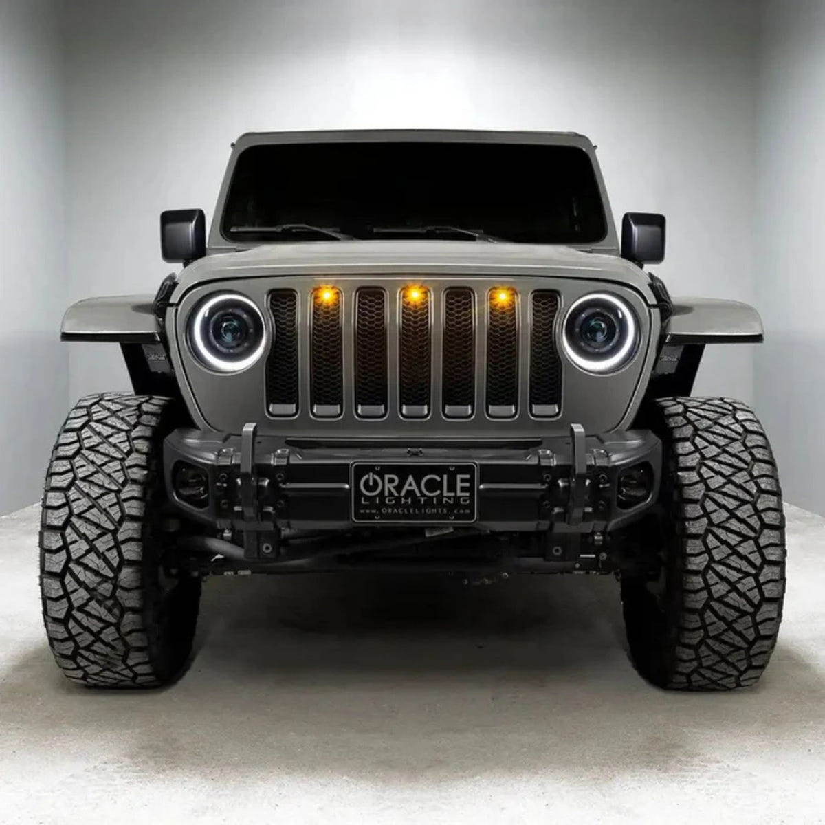 Oculus Bi-LED headlights beam pattern cutoff test showing sharp DOT compliant line on wall
