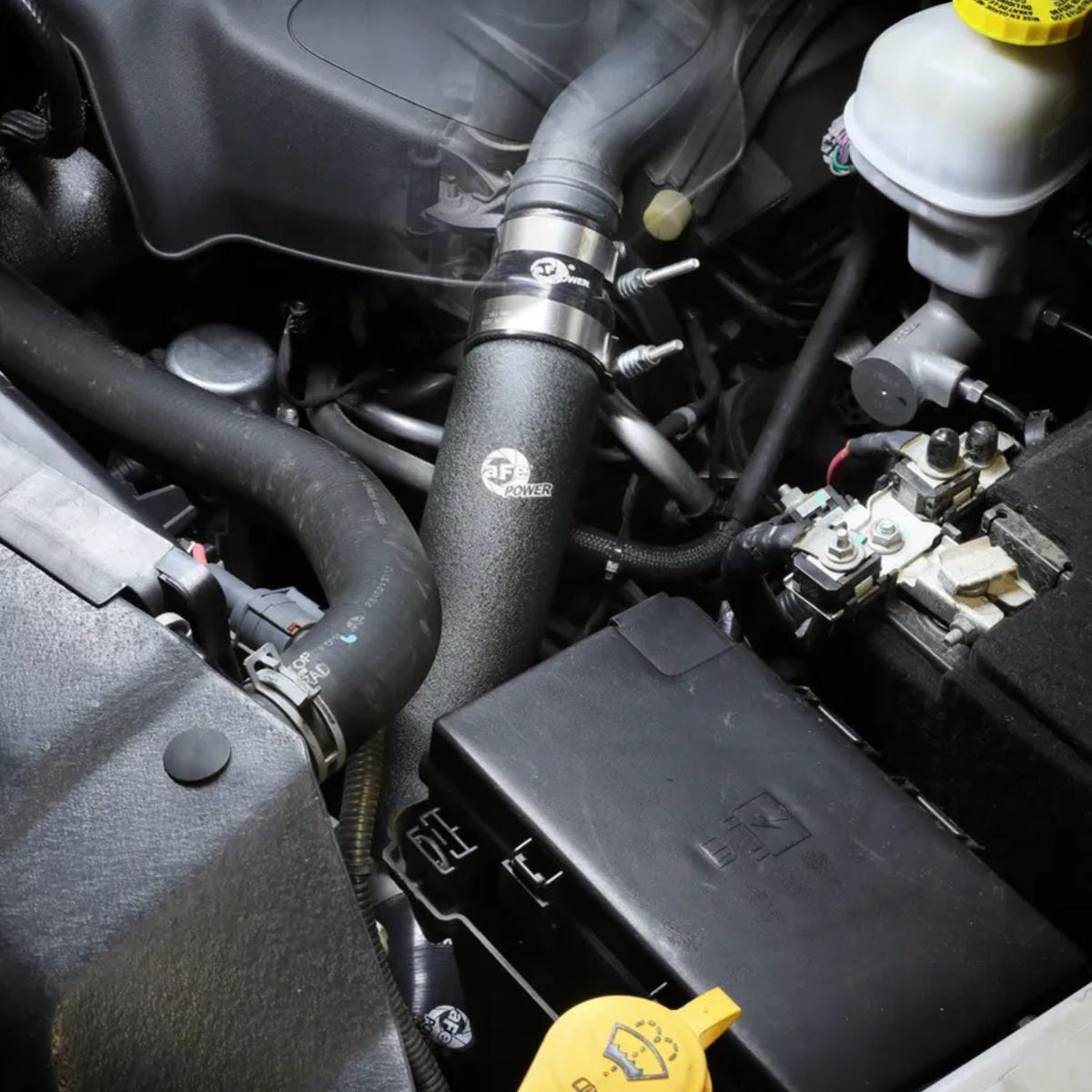 Black powder-coated aluminum intercooler pipes for 2016-2019 Ram 1500 V6 EcoDiesel by AFE BladeRunner