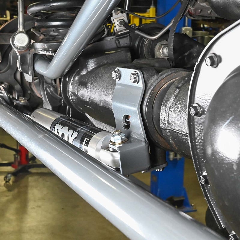 Synergy Manufacturing Steering Stabilizer Relocation Bracket for 14-25 Ram 2500 and 3500 4WD