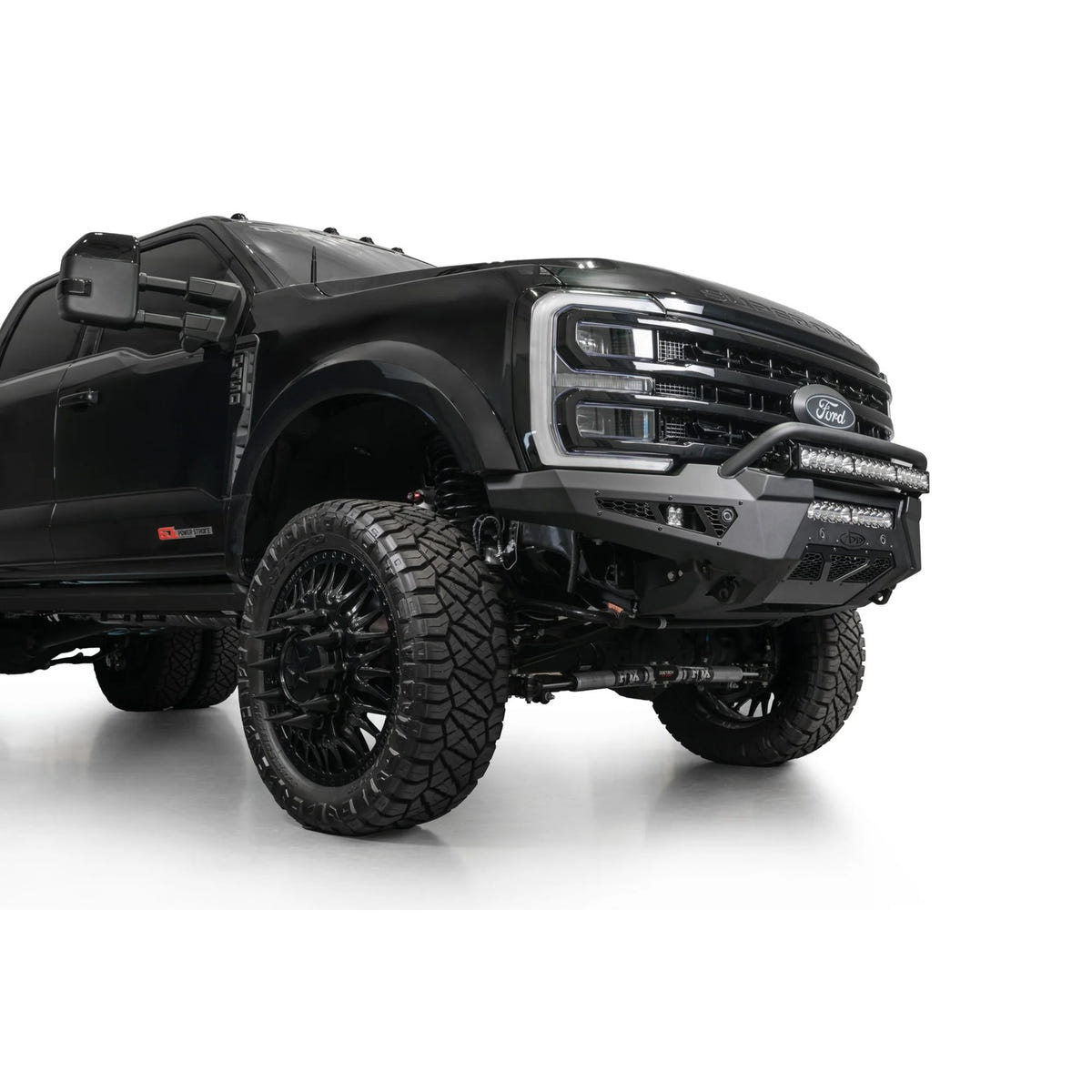 Addictive Desert Designs HoneyBadger Front Bumper With Top Hoop 23-26 Ford 6.7L Super Duty