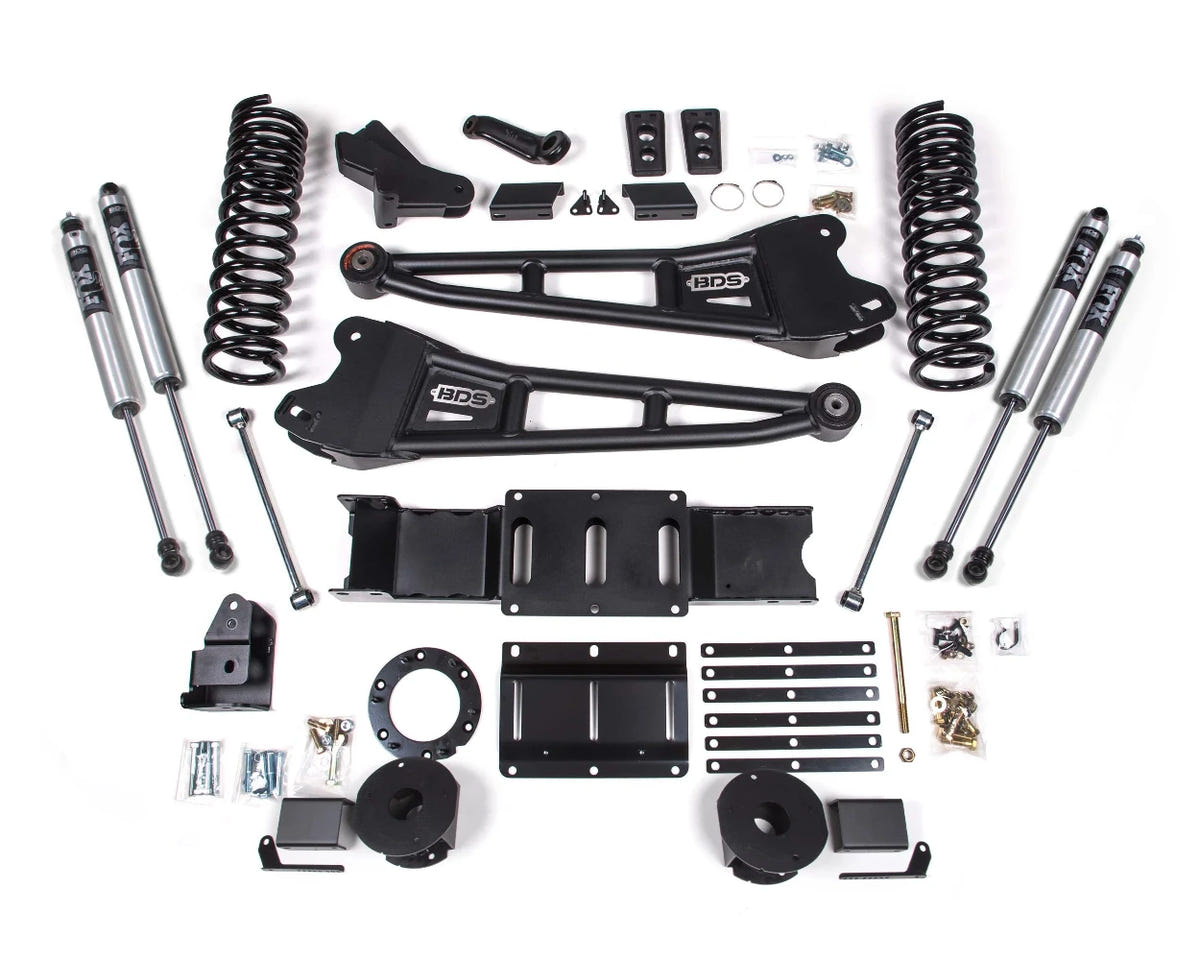 Collection of automotive suspension components on a white background