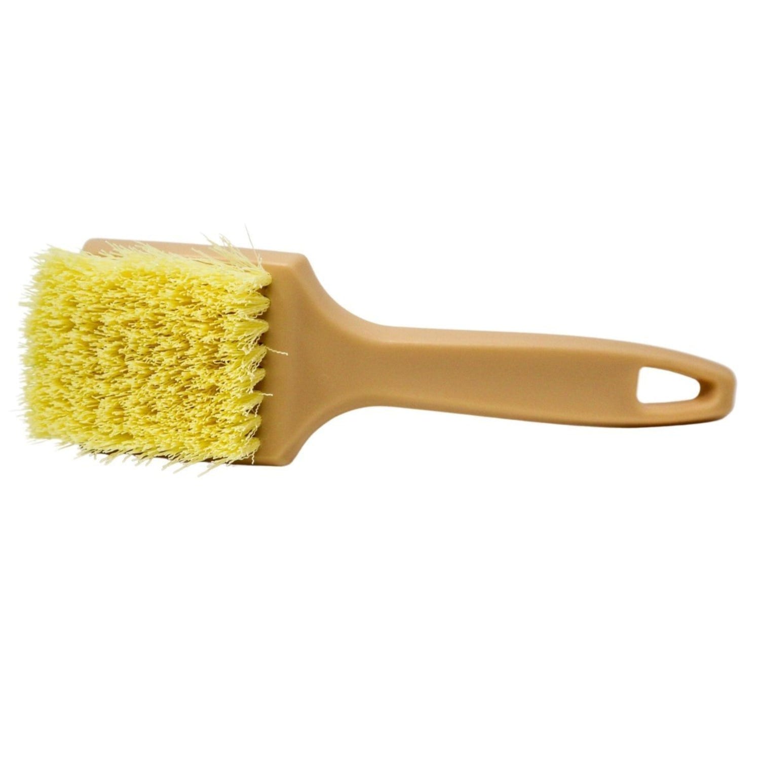 Yellow brush with a beige handle on a white background