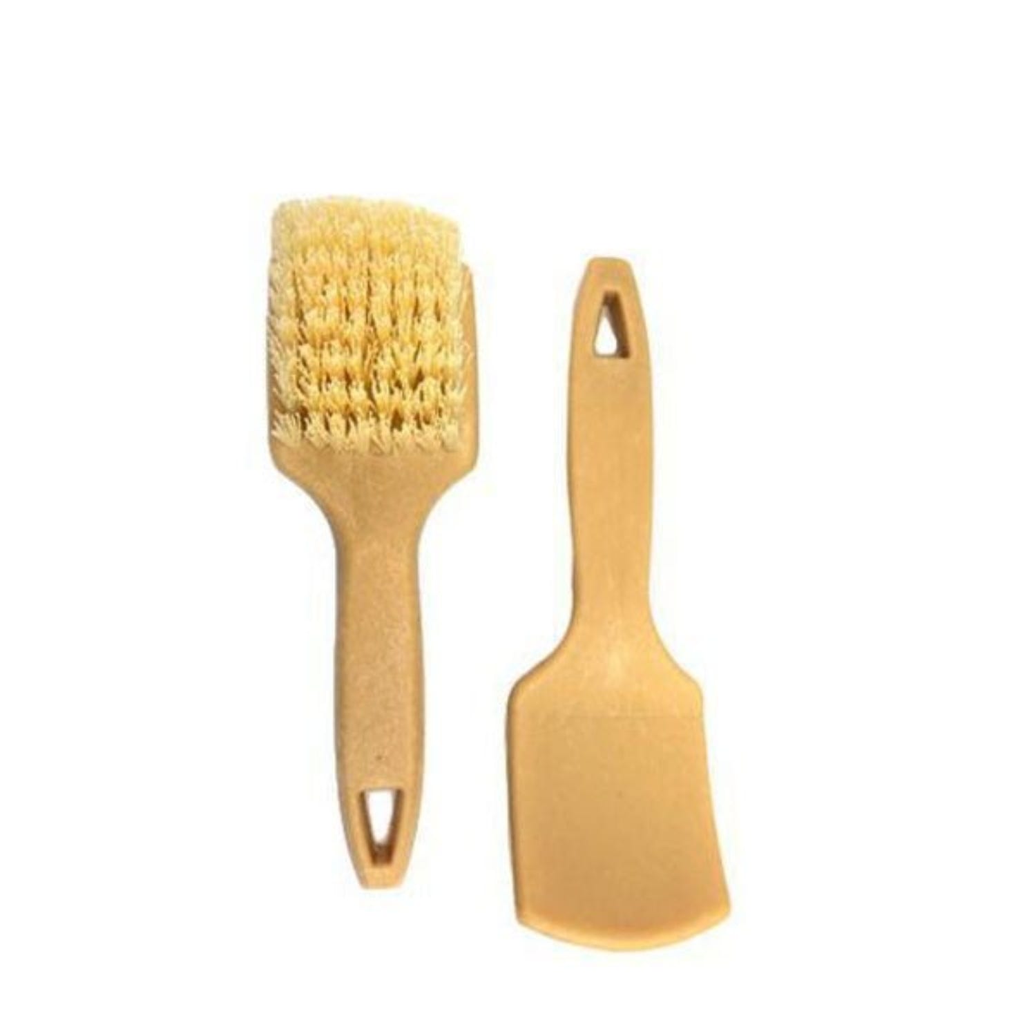 Two wooden brushes with natural bristles on a white background