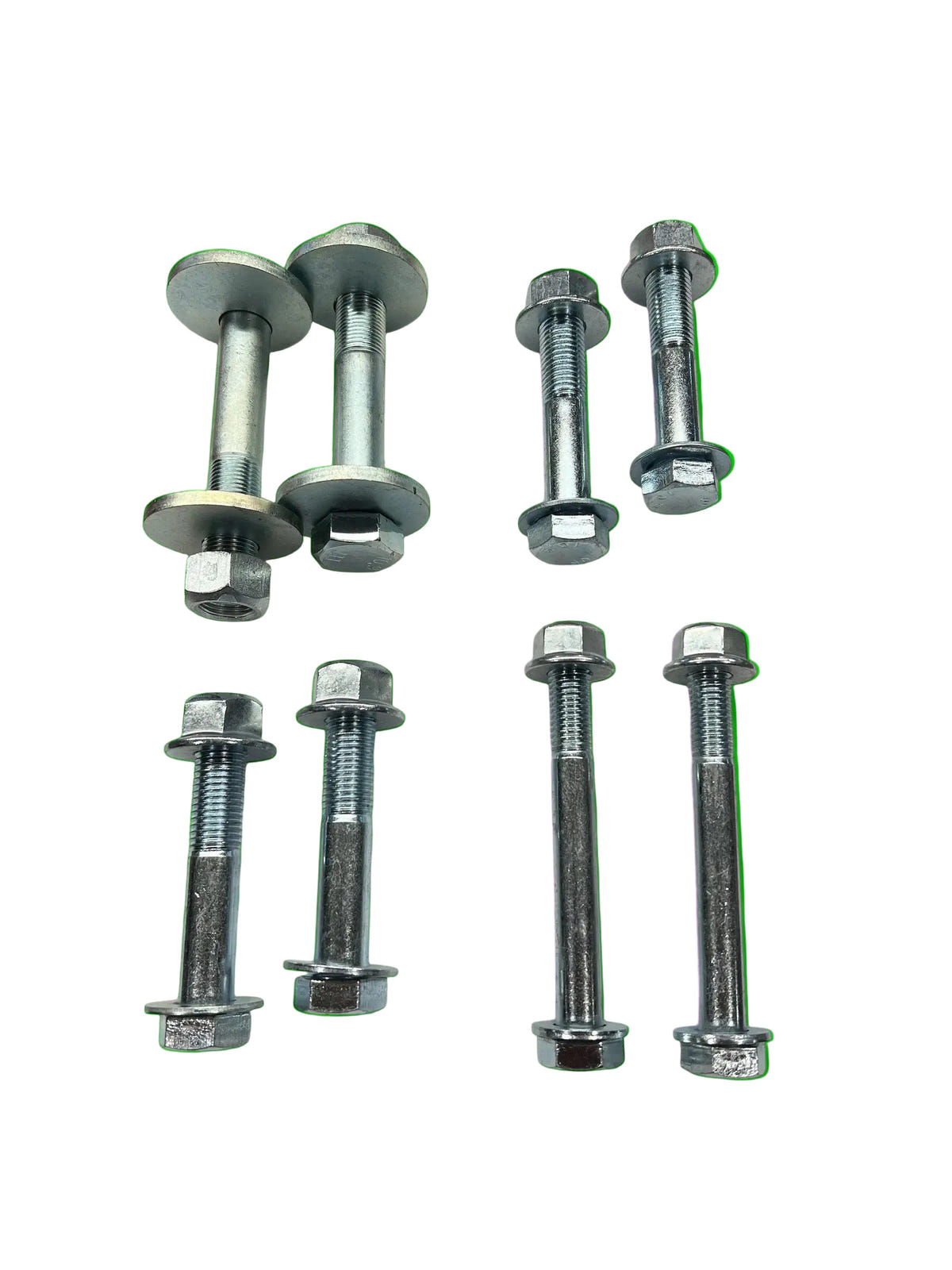 Set of metal bolts on a green background