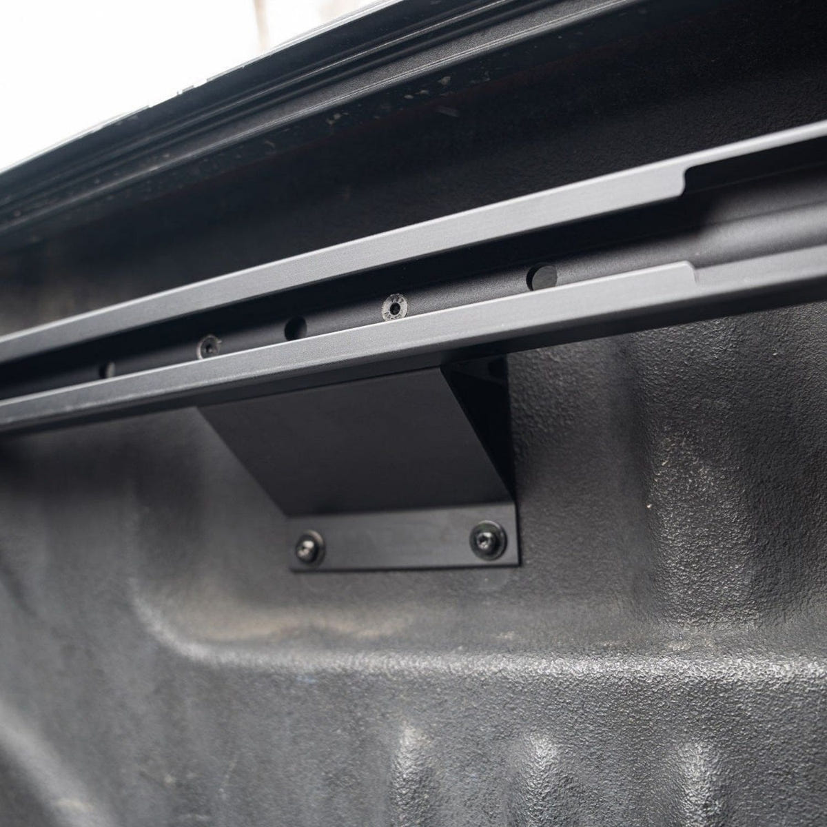 Powder-coated aluminum Integral rails installed on a 2017-2026 Ford Super Duty truck bed