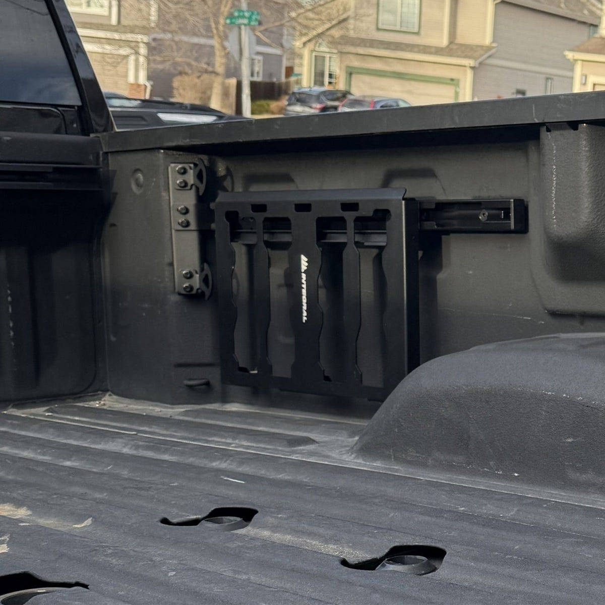 Integral Truck Rail Kit mounted near the cab and tailgate of a 2020-2026 GM HD truck