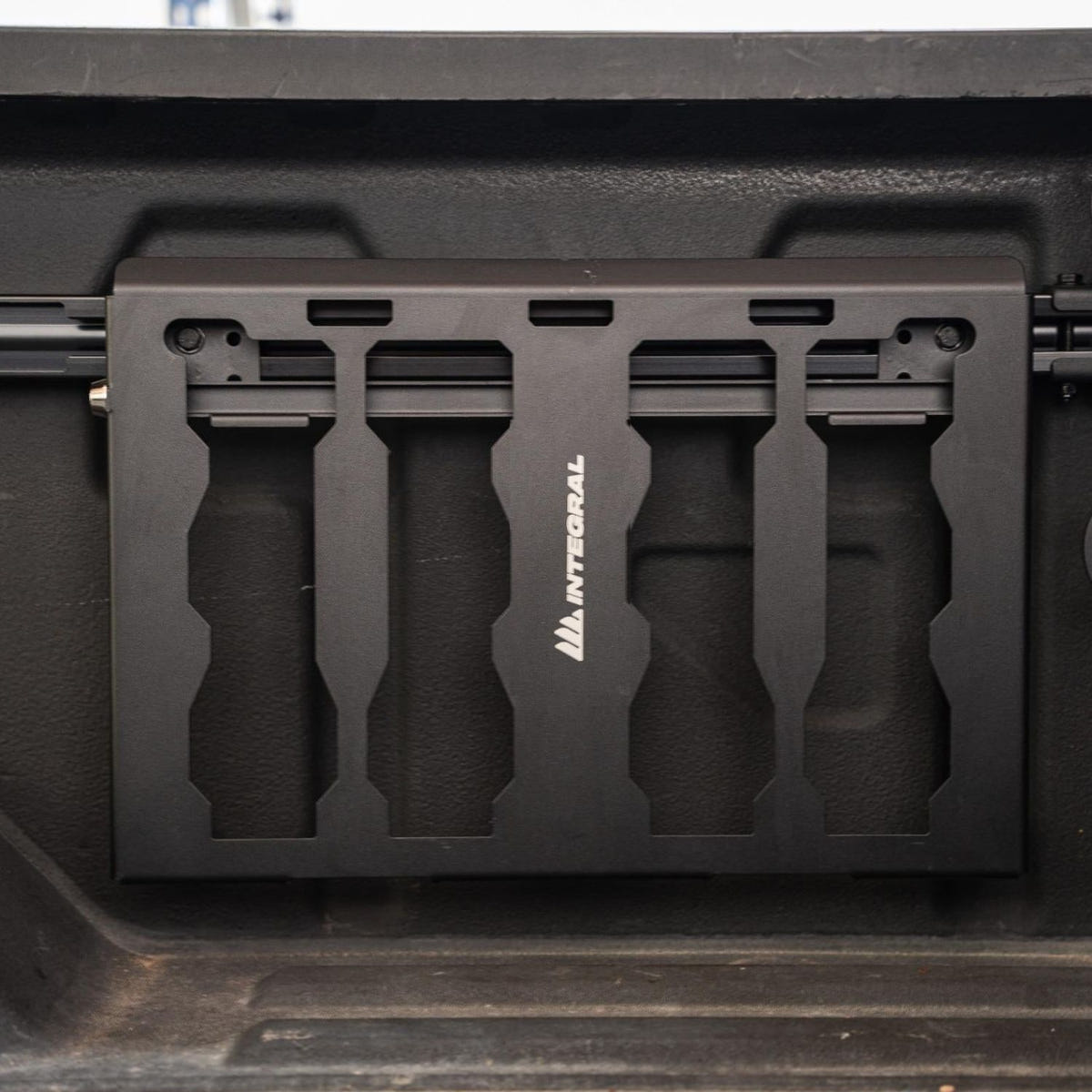 Half-size Packout panels mounted to the Integral rear rail system on a GM HD truck
