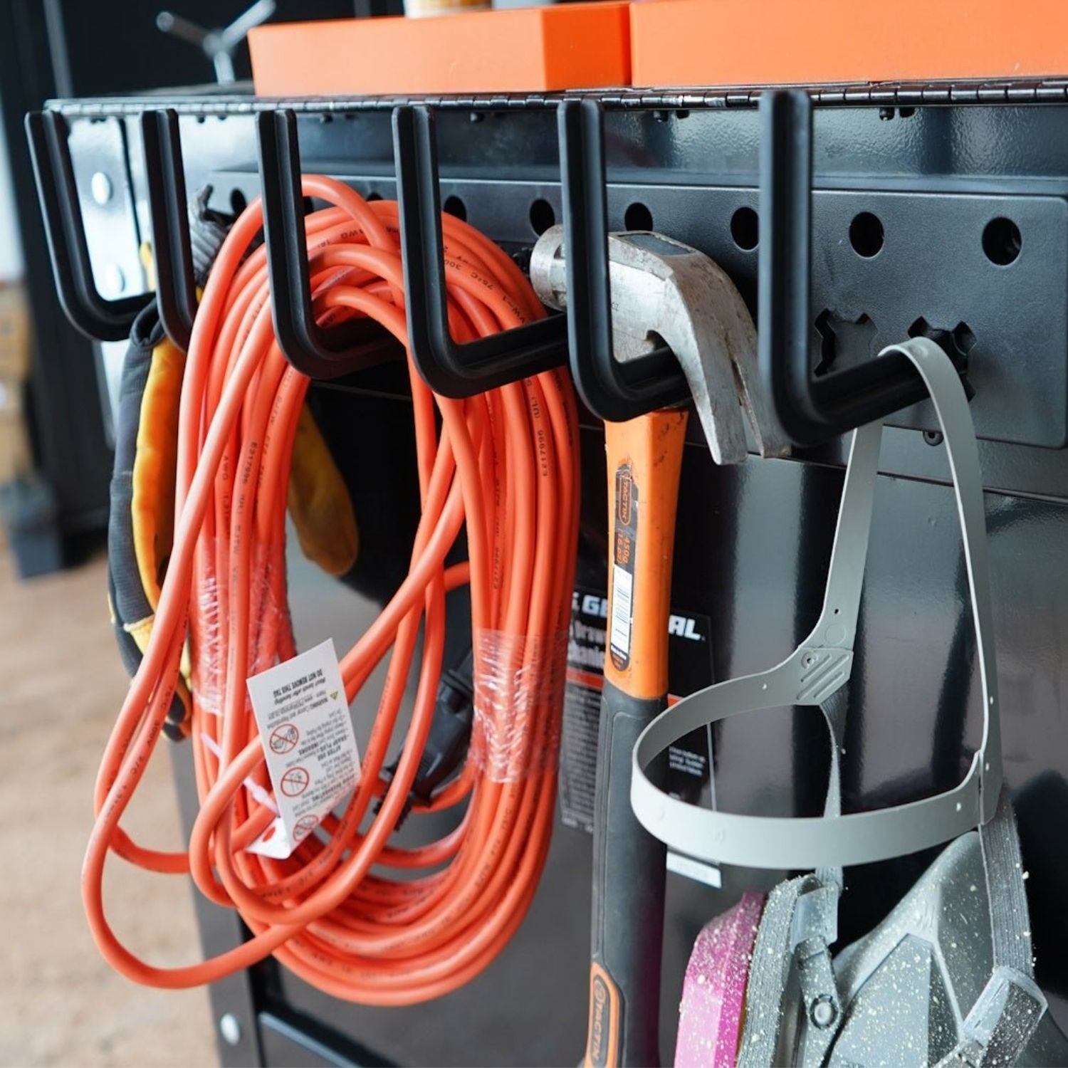 Magnetic ToolHanger hook hangers for organizing brooms, extension cords, and hand tools