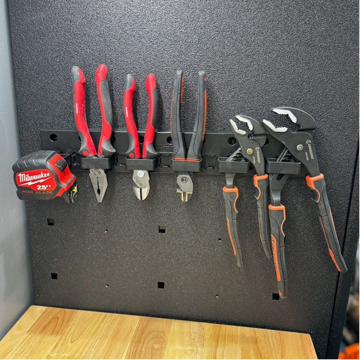 Magnetic ToolHanger plier holders for organizing pliers, pruners, and hand tools