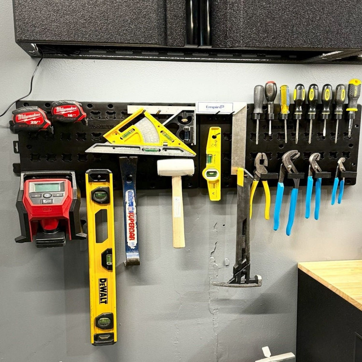 ToolHanger 35 Piece garage tool organizer with twist-and-lock hangers