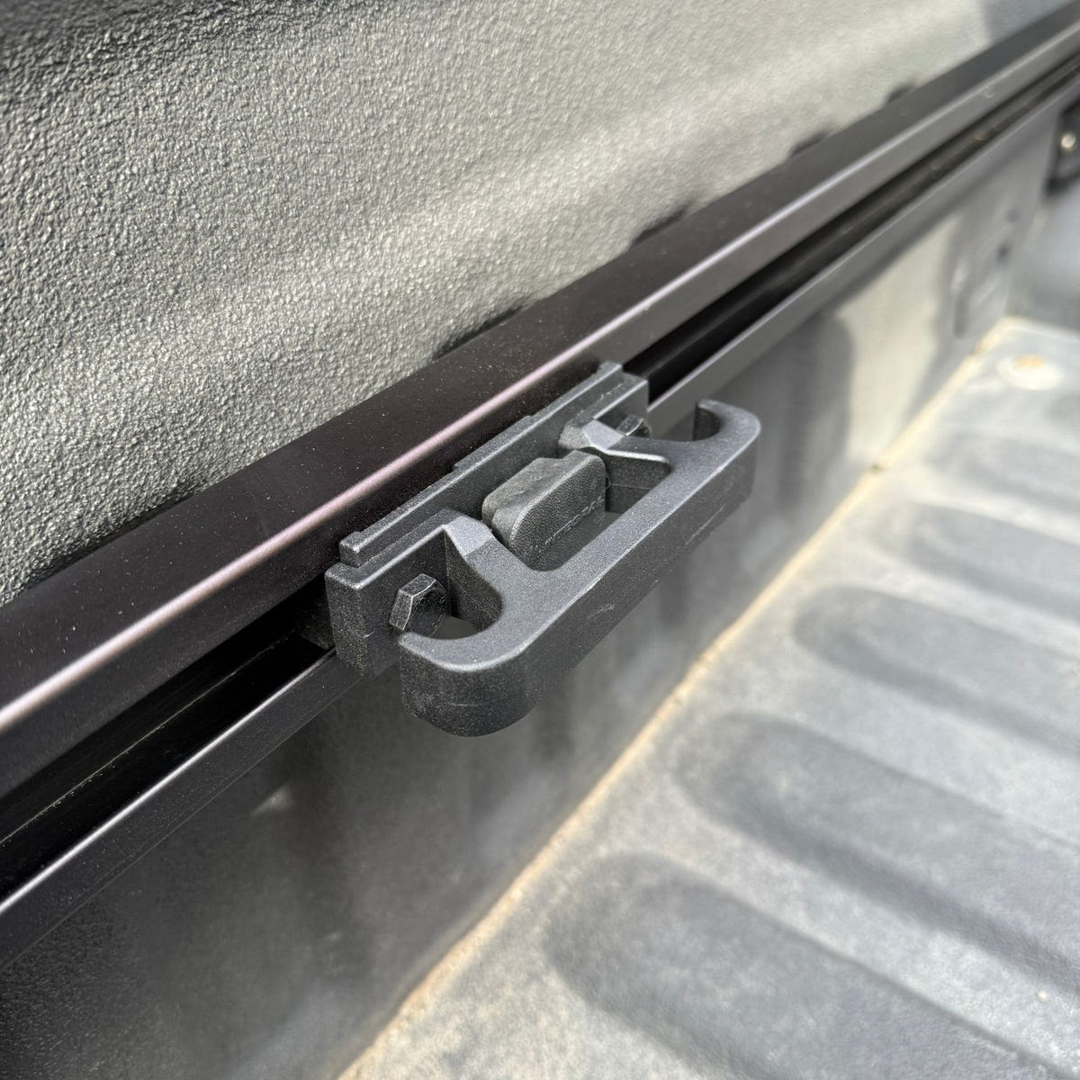 Integral Truck Bulkhead Rail with adjustable Slide-N-Lock tie-down cleat for Ford Super Duty