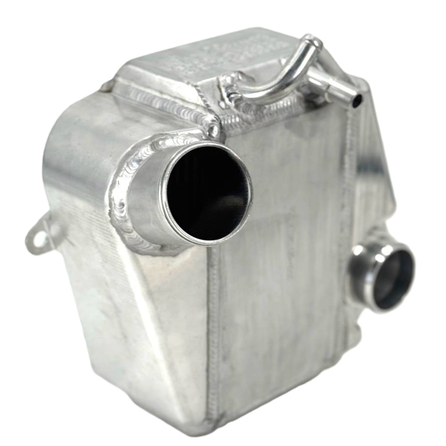 A silver aluminum engine block or radiator component with welded metal pipes and mounting points, shown on a plain white background.