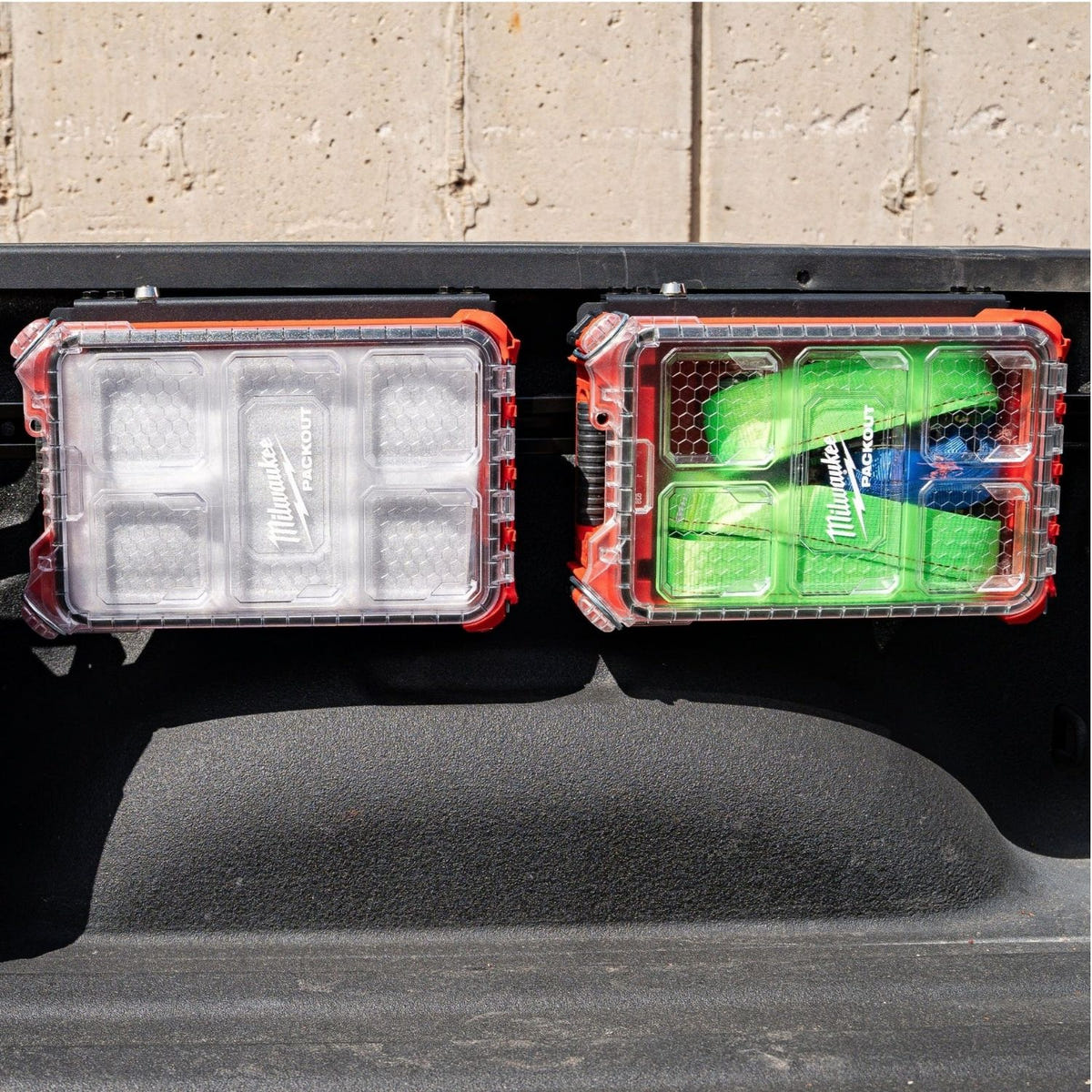 Black anodized Integral half panel mounted to OEM Mopar bedside utility rails on a 2019-2026 Ram 1500