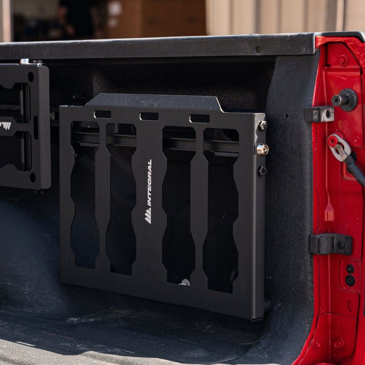 Integral Trucks Full Panel Kit attached to factory Mopar utility rails on a 2019-2026 Ram 1500 truck bed