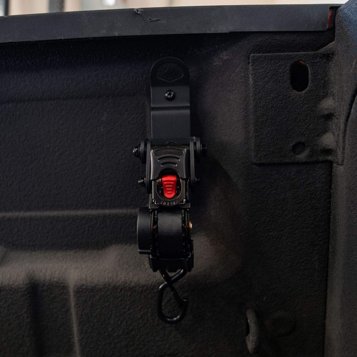 Integral Truck cargo management swivel strap installed in Ram truck bed