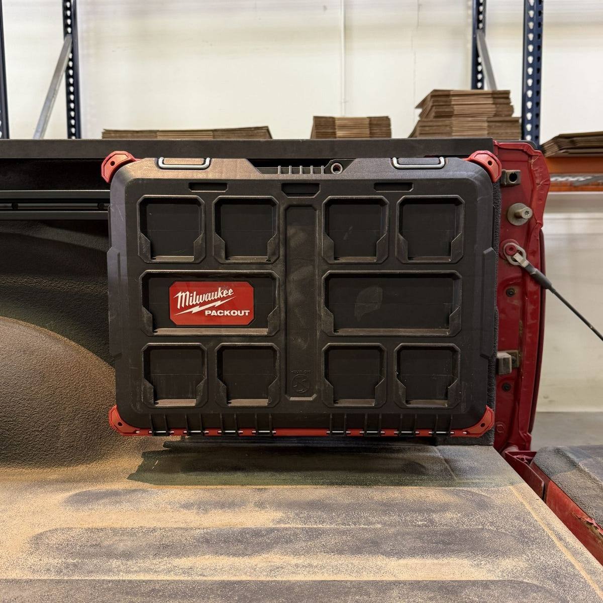 Integral cargo organization panel installed on a 2019-2026 Ram 2500/3500 long bed with keyed locking mounts