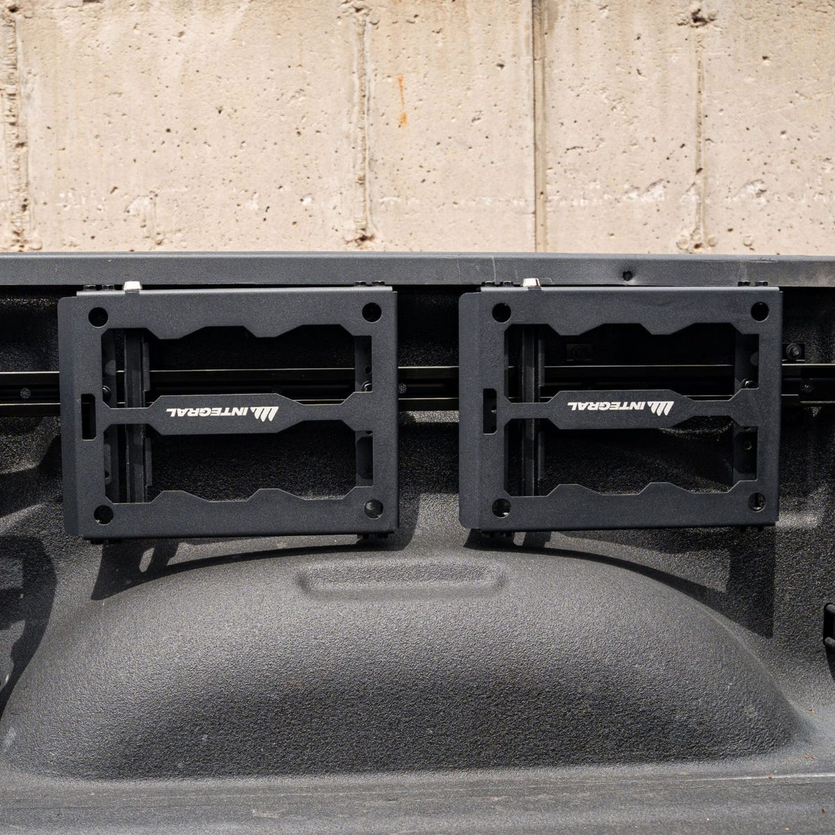 Integral cargo organization panel installed on a 2019-2026 Ram 2500/3500 long bed with keyed locking mounts