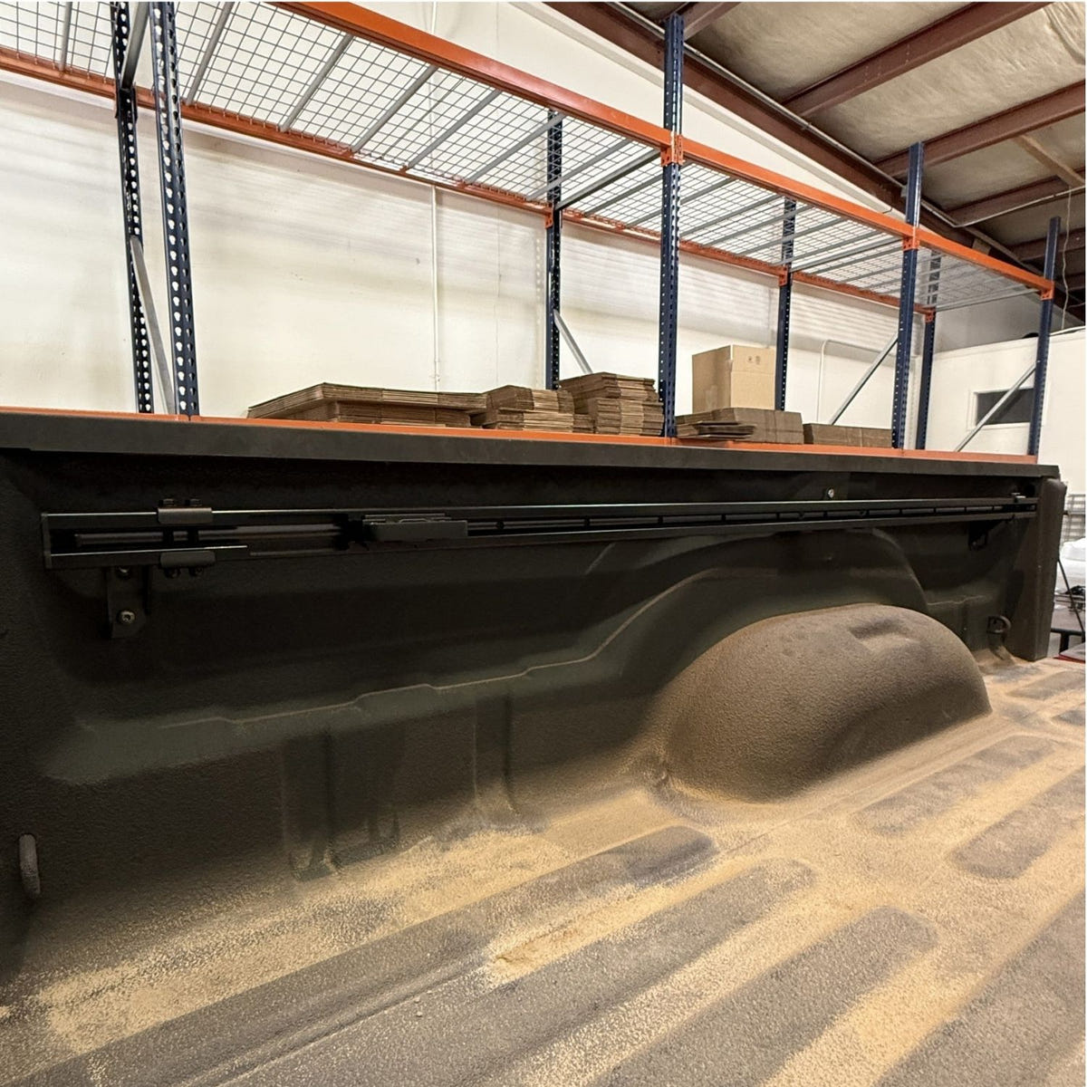 Cargo management rails for 2019+ Ram HD 8-foot beds featuring repositionable tie-down anchors