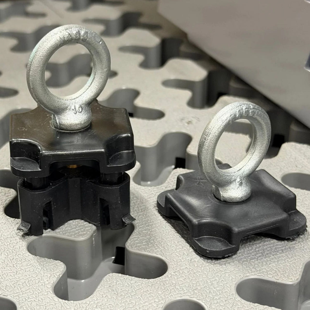 Tmat Bungee Anchors installed in cargo grid for attaching bungee cords