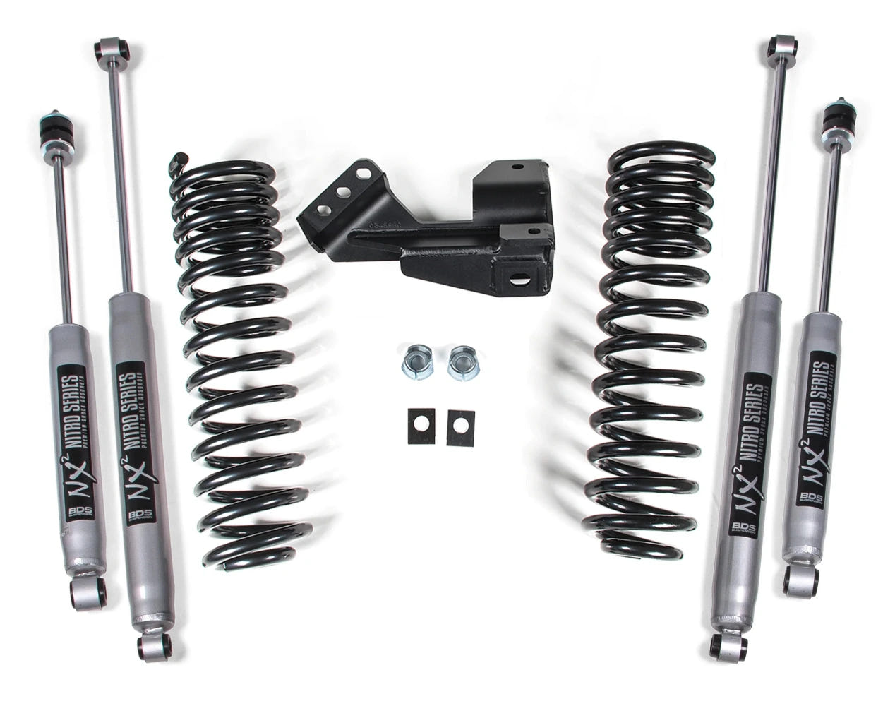 Set of suspension components including shock absorbers and springs on a white background