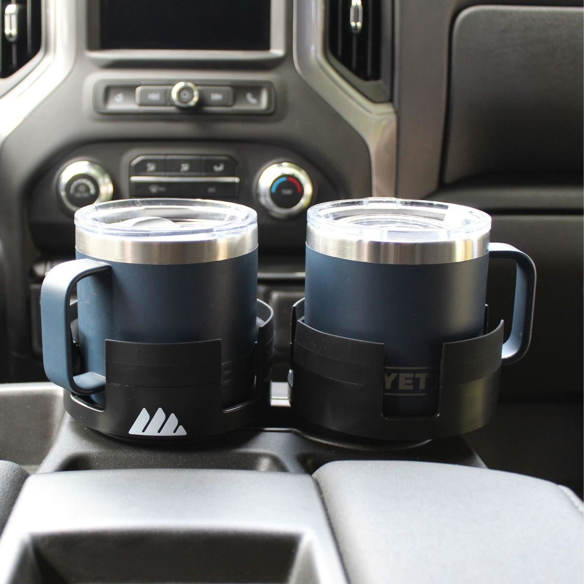 Adjustable Mug Integrator installed in a vehicle cup holder