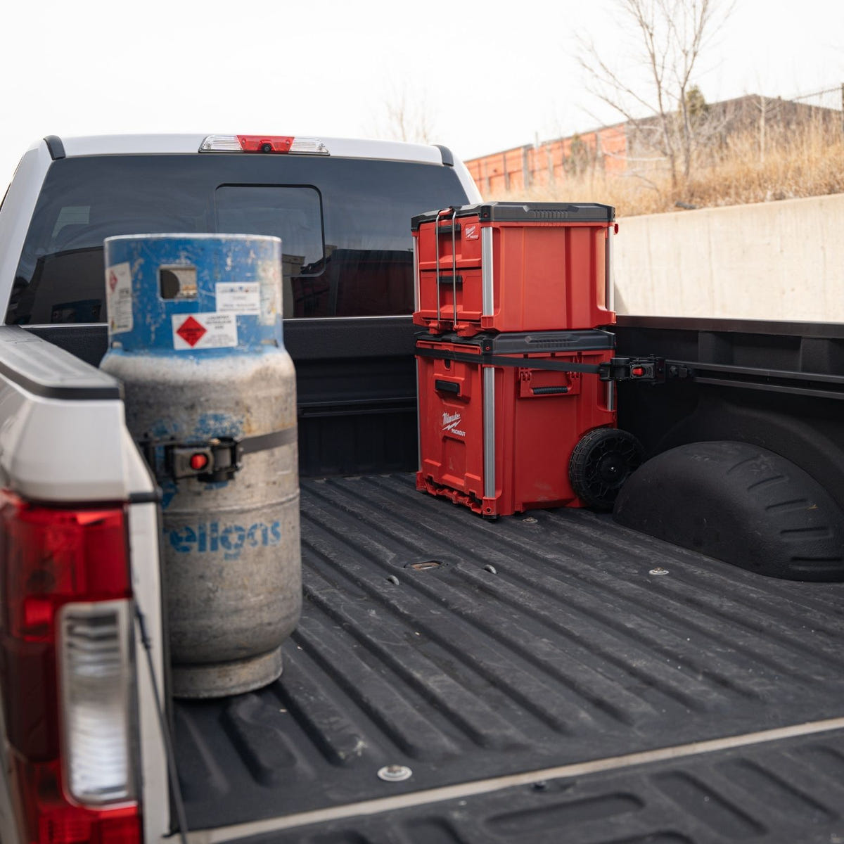 Integral Truck retractable cargo tie-down with 400 lb working load limit and 1,200 lb break strength