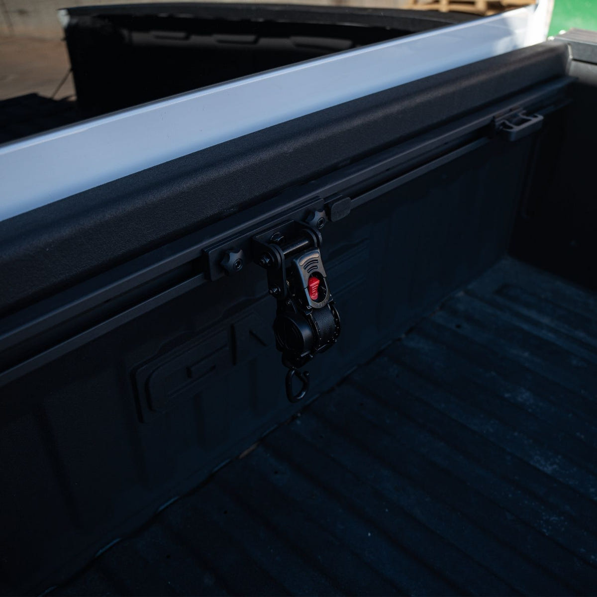 Integral Truck Bulkhead Rail cargo management system installed in a spray-lined GM truck bed