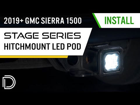 Hitch-mounted C1R LED reverse light installed on a Chevrolet Silverado 1500