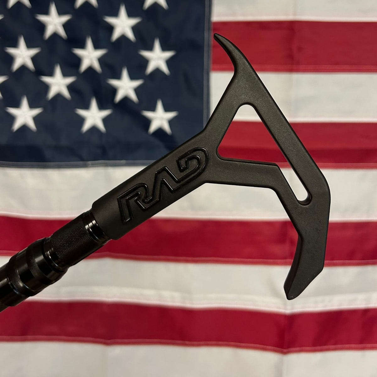 RAD Truck Straps Telescoping RAD Grabber with carbon fiber pole and black logo for retrieving cargo from truck beds