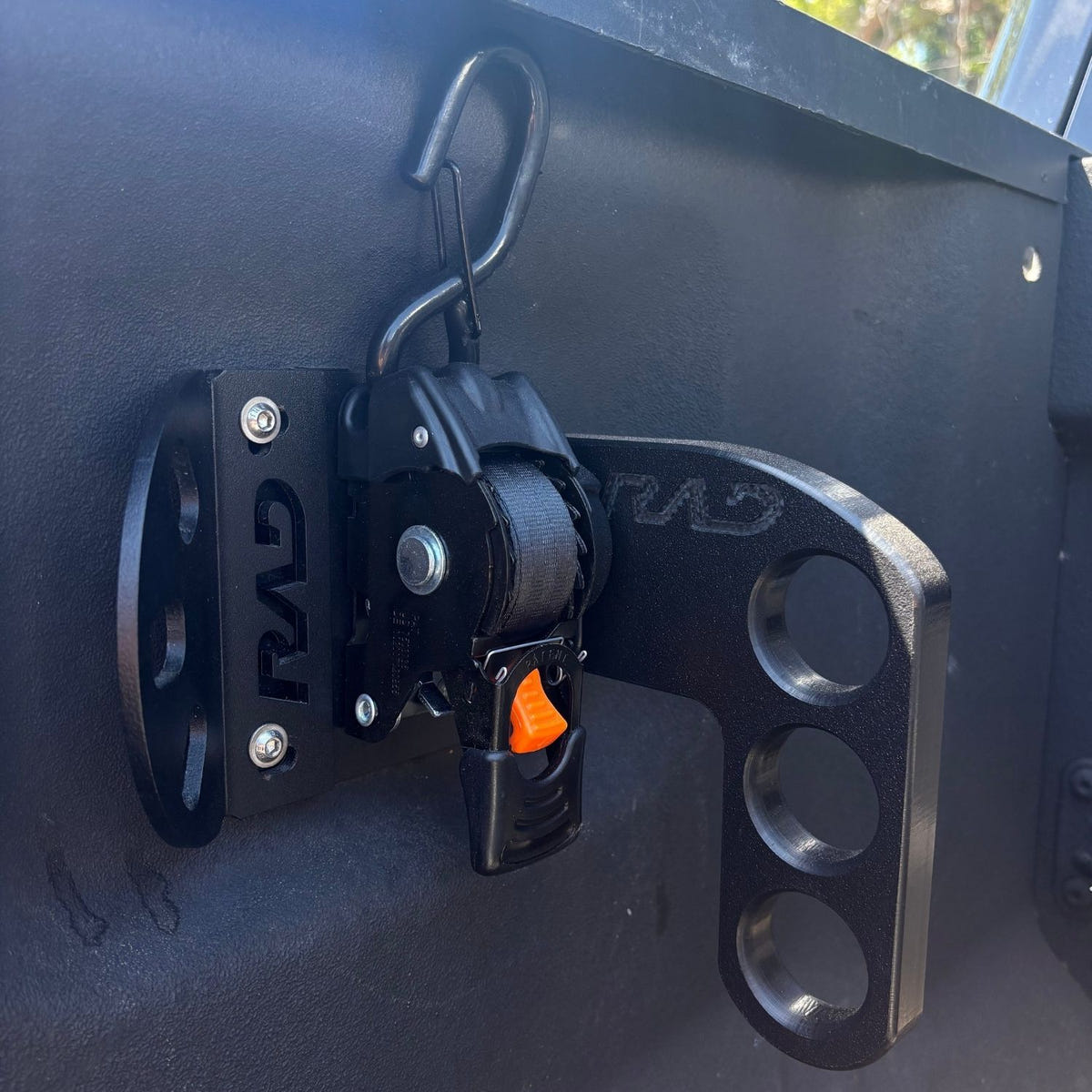 RAD Fishing Rod Holder installed in a Ford truck bed holding fishing rods upright and organized