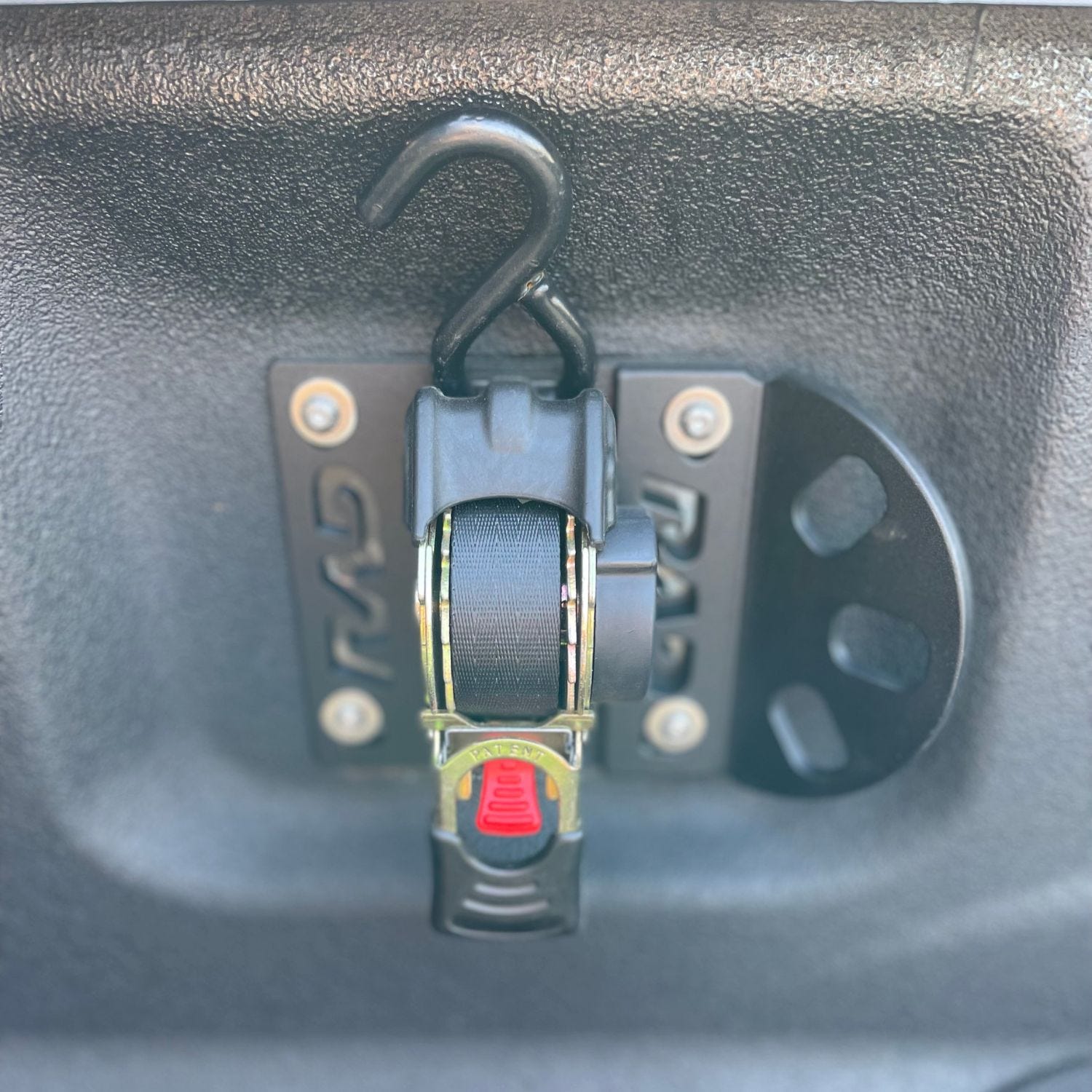 Close-Up of RAD Black Hook Plate Mounted in Ford Truck Bed BoxLink Anchor Point
